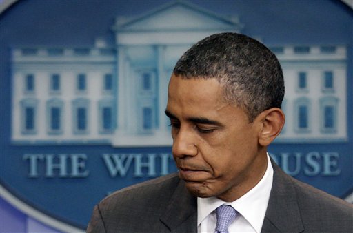 President Barack Obama turns to leave after speaking from White House briefing room, Sunday, July 31, 2011 in Washington, about a deal being reached to raise the debt limit.  (AP Photo/Carolyn Kaster) (AP)