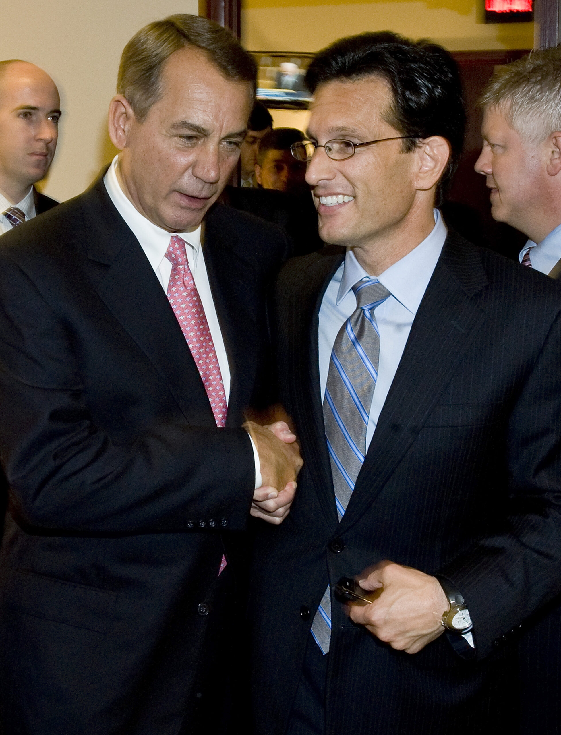 U.S. House Speaker John Boehner (R-OH) (L) shakes hands with with Majority Leader Eric Cantor (R-VA) (R) as they depart after a news conference about debt relief legislation at the U.S. Capitol in Washington August 1, 2011. Congressional leaders scrambled for enough support from skeptical lawmakers on Monday to push through an 11th-hour deal to raise the U.S. borrowing limit and avert a potentially devastating debt default. REUTERS/Jonathan Ernst   (UNITED STATES - Tags: POLITICS BUSINESS) (Reuters)