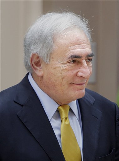 FILE- In this July 6, 2011 photo, Former IMF head Dominique Strauss-Kahn leaves his rented house in New York. The lawyer for the woman who accused Strauss-Kahn of sexual assault said Saturday, Aug. 20, 2011, that he believes prosecutors plan to dismiss some or all of the charges. (AP Photo/Seth Wenig, File) (AP)