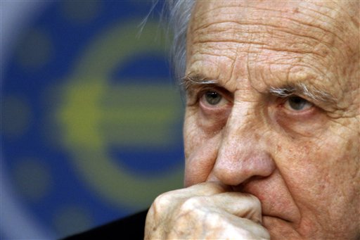 President of the European Central Bank Jean-Claude Trichet listens to a journalist's question during a news conference after a council meeting in Frankfurt, central Germany, Thursday, Aug. 4, 2011. The European Central Bank decided to keep the main interest rate unchanged at 1.5 percent. (AP Photo/dapd, Mario Vedder) (AP)