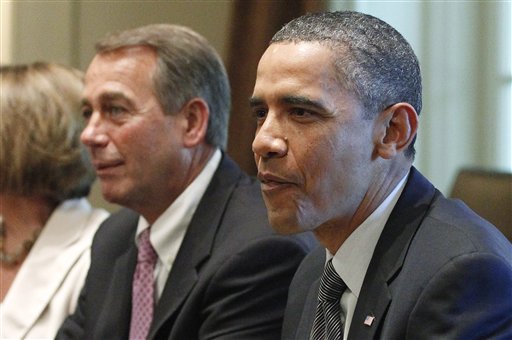 President Barack Obama and House Speaker John Boehner of Ohio, take part in a meeting  in the Cabinet Room of the White House in Washington, Thursday, July 14, 2011, with Republican and Democratic leaders regarding the debt ceiling. (AP Photo/Charles Dharapak) (AP)