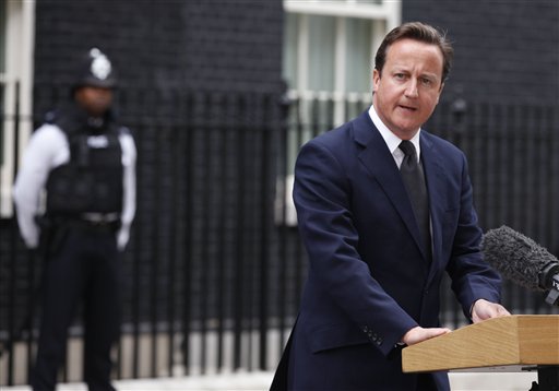 British Prime Minister David Cameron addresses the media outside 10 Downing Street in London Tuesday, Aug. 9, 2011. Cameron announced the recall of Parliament from its summer recess to deal with the crisis touched off by three days of rioting in London. The Prime Minister described the scenes of burned buildings and smashed windows on the streets of London and several other British cities as "sickening." However, he refrained from ordering more extreme anti-rioting measures, such as calling in the military to help the beleaguered police restore order.(AP Photo/Elizabeth Dalziel) (AP)