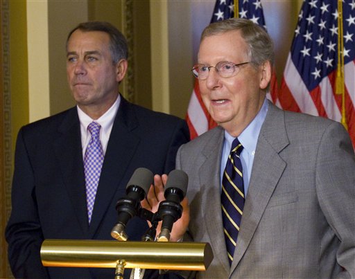 House Speaker John Boehner, R-Ohio, and Senate Minority Leader Mitch McConnell, R-Ky., speak at a news conference on Capitol Hill in Washington, Saturday, July 30, 2011.(AP Photo/Harry Hamburg) (AP)