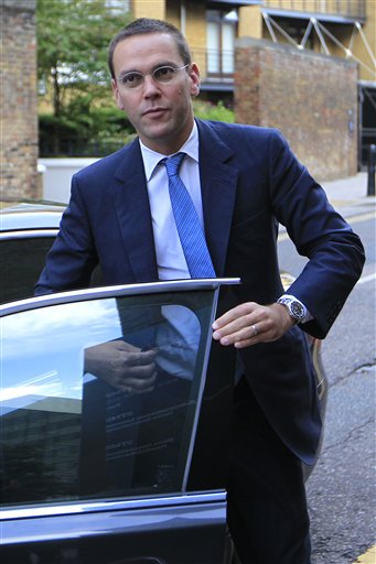 FILE - In this July 19, 2011 file photo, Chief executive of News Corporation Europe and Asia, James Murdoch, arrives at the News International headquarters in London. (AP Photo/Sang Tan, file) (AP)