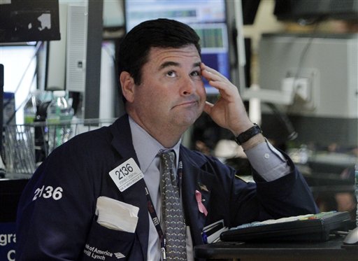 Specialist Stephen Steinthal works at his post on the floor of the New York Stock Exchange Wednesday, Aug. 10, 2011. (AP Photo/Richard Drew) (AP)