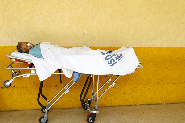 A Costa Rican patient awaits care in a San Jose hospital on July 20, 2011