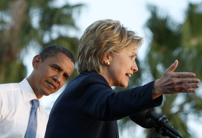 U.S. Democratic presidential nominee Senator Barack Obama (D-IL) and Senator Hillary Clinton (D-NY) attend a campaign rally in Orlando, Florida, in this file image taken October 20, 2008. Clinton emerged on November 13, 2008 as a candidate to be U.S. Secretary of State for president-elect Obama, months after he defeated her in an intense contest for the Democratic presidential nomination. Picture taken October 20, 2008.  REUTERS/Jim Young/Files    (UNITED STATES) US PRESIDENTIAL ELECTION CAMPAIGN 2008 (USA) (Â© Jim Young / Reuters)
