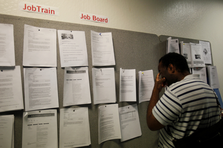 In this photograph taken July 20, 2010, Orlando Payton looks for work at JobTrain employment office in Menlo Park, Calif. The recovery lost momentum in the second quarter as growth slowed to a 2.4 percent pace, its most sluggish showing in nearly a year and too weak to drive down unemployment. (AP Photo/Paul Sakuma) (Paul Sakuma)