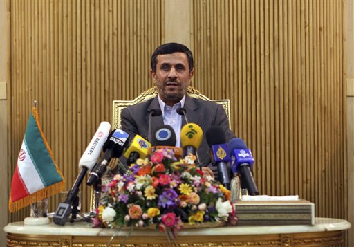 Iranian President Mahmoud Ahmadinejad briefs the media, prior to departing Tehran's Mehrabad airport for a trip to Tajikistan, Sunday, Sept. 4, 2011. (AP Photo/Vahid Salemi) (AP)