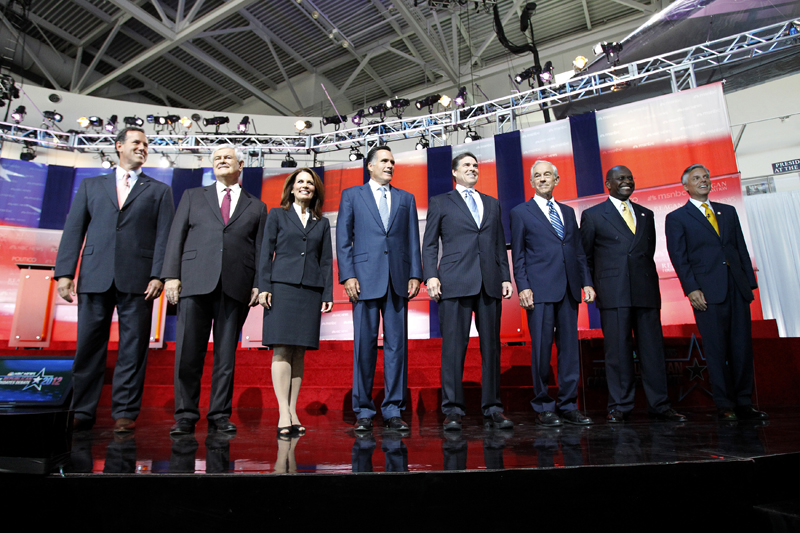 Republican presidential candidates (L-R): Rick Santorum, Newt Gingrich, Michele Bachmann, Mitt Romney, Rick Perry, Ron Paul, Herman Cain, and Jon Huntsman stand on stage before the start of the Reagan Centennial GOP presidential primary debate at the Ronald Reagan Presidential Library in Simi Valley, California September 7, 2011.  REUTERS/Mario Anzuoni (UNITED STATES - Tags: POLITICS) (Â© Mario Anzuoni / Reuters)