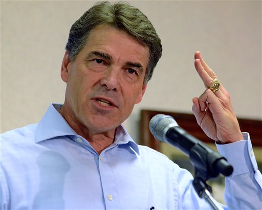 FILE - In this Aug. 20, 2011, file photo, Republican presidential candidate Texas Gov. Rick Perry speaks to supporters at Tommy's Ham House in Greenville, S.C. A new Associated Press-GfK poll finds that Republicans are growing more satisfied with their choices for president. And so far they like what theyre hearing from Perry. (AP Photo/Richard Shiro, File) (AP)
