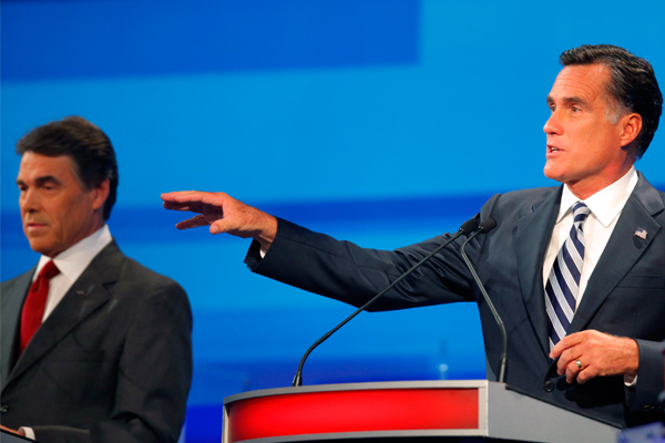 Rick Perry and Mitt Romney (Reuters/Scott Audette)