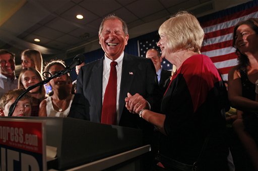 Bob Turner, center, joined by his wife Peggy, right, and family smiles as he  delivers his victory speech during an election night party, Wednesday, Sept. 14, 2011 in New York. Turner says his win in a heavily Democratic New York City district is a "loud and clear" message to Washington. Turner defeated Democratic Assemblyman David Weprin  on Tuesday to succeed Anthony Weiner who resigned amid a sexting scandal. It's the first time a Republican has been elected in the district. (AP Photo/Mary Altaffer) (AP)