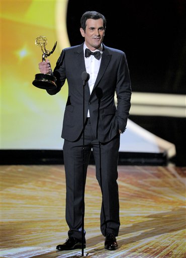 Ty Burrell accepts the award for outstanding supporting actor in a comedy series for Modern Family at the 63rd Primetime Emmy Awards on Sunday, Sept. 18, 2011 in Los Angeles. (AP Photo/Mark J. Terrill) (AP)