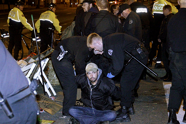 A Occupy Portland demonstrator is arrested on Thursday, Oct. 13, 2011, in Portland, Ore. (AP/Rick Bowmer)