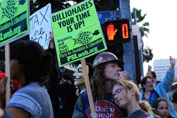 Protesters march in support of the Occupy Wall Street protests. (Reuters/Lucy Nicholson)