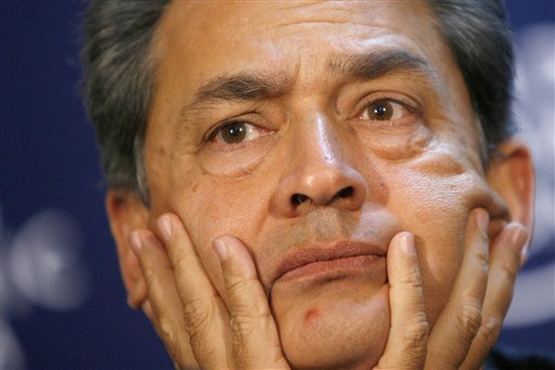 Rajat Kumar Gupta, former Chairman of Global Fund to Fight AIDS, Tuberculosis and Malaria, listens to a statement, during a session at the World Economic Forum in Davos, Switzerland, in 2009. (AP/Keystone/Alessandro Della Bella)