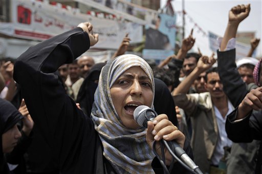Yemeni activist Tawakkul Karman chants slogans along with anti-government protestors, during a demonstration demanding the resignation of Yemeni President Ali Abdullah Saleh, in Sanaa, Yemen, in June. (AP/Hani Mohammed)