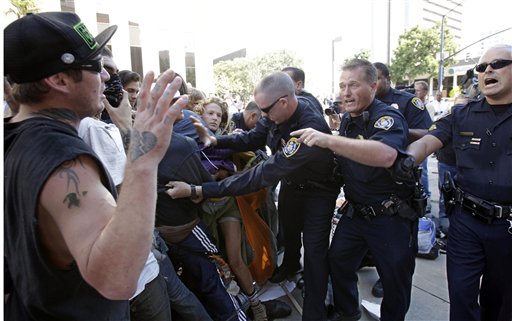 San Diego Police clash with demonstrators at the Civic Center Plaza Friday, Oct. 14, 2011 in San Diego. (AP/Lenny Ignelzi)
