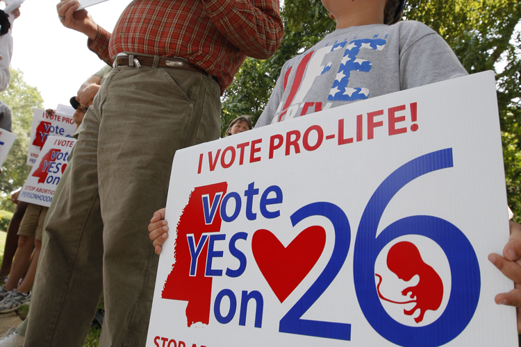 Protestors during a prayer rally for the Personhood Amendment at the Capitol in Jackson, Mississippi (Rogelio V. Solis/AP)