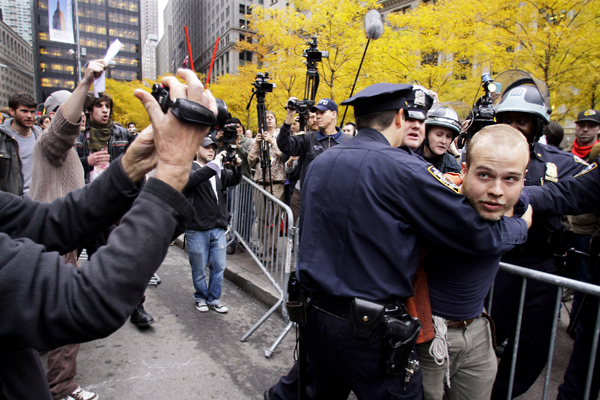 Police arrest an Occupy Wall Street protester at Zuccotti Park on Tuesday, Nov. 15, 2011 in New York. (AP/Bebeto Matthews)