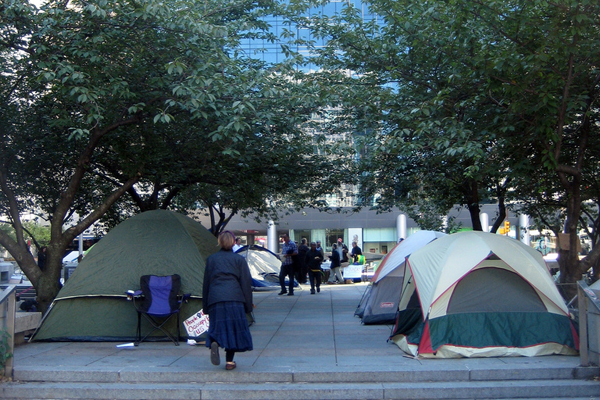 Occupy Philadelphia tis hreatened with eviction. (<span about='http://www.flickr.com/photos/janeanger/6221941518/' xmlns:cc='http://creativecommons.org/ns#'><a href='http://www.flickr.com/photos/janeanger/6221941518/' rel='cc:attributionURL' target='_blank'>ellectricity</a> / <a href='http://creativecommons.org/licenses/by/3.0/' rel='license' target='_blank'>CC BY 3.0</a></span>)