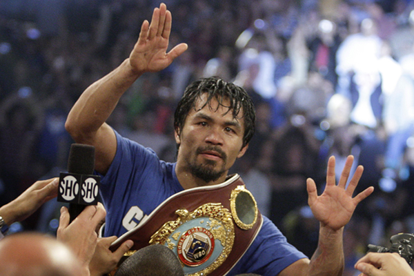 Manny Pacquiao of the Philippines celebrates his victory over Shane Mosley of the U.S. after the WBO welterweight title fight at the MGM Grand Garden Arena in Las Vegas on May 7, 2011. (Steve Marcus / Reuters)