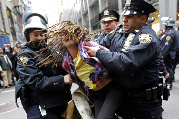 An Occupy Wall Street demonstrator is arrested by New York City police. (Mike Segar / Reuters)