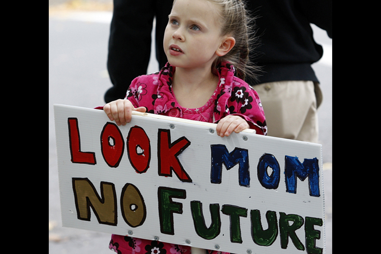 Abigail Garrett, 6, of Hamden, Connecticut contemplates her future (Jessica Rinaldi / Reuters)