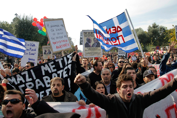 Protesters shout slogans as they protest against austerity policies in Greece. (Reuters/Grigoris Siamidis)