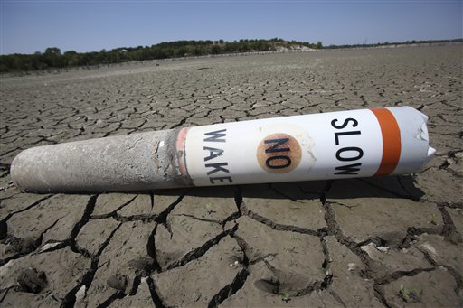 A buoy sits high and dry at Benbrook Lake in Benbrook, Texas on August 16, 2011 (AP Photo/LM Otero)