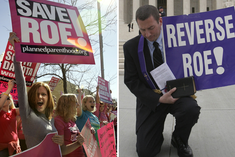 Demonstrators protest South Dakota's abortion ban. Right: National Clergy Council president Rev. Rob Schenck holds a one-man counter protest, as abortion rights demonstrators gather outside the Supreme Court in Washington, April 18, 2007. (AP)