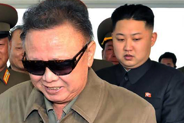 Kim Jong Il, left, with his son Kim Jong Un (AP)