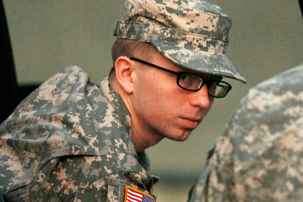 Bradley Manning is escorted from a security vehicle to a courthouse in Fort Meade, Md., on Monday. (AP/Patrick Semansky)