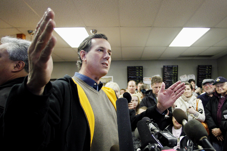 Republican presidential candidate, former Pennsylvania Sen. Rick Santorum speaks during a campaign stop at the Rising Sun Cafe, Monday, Jan. 2, 2012, in Polk City, Iowa. (AP/Eric Gay)
