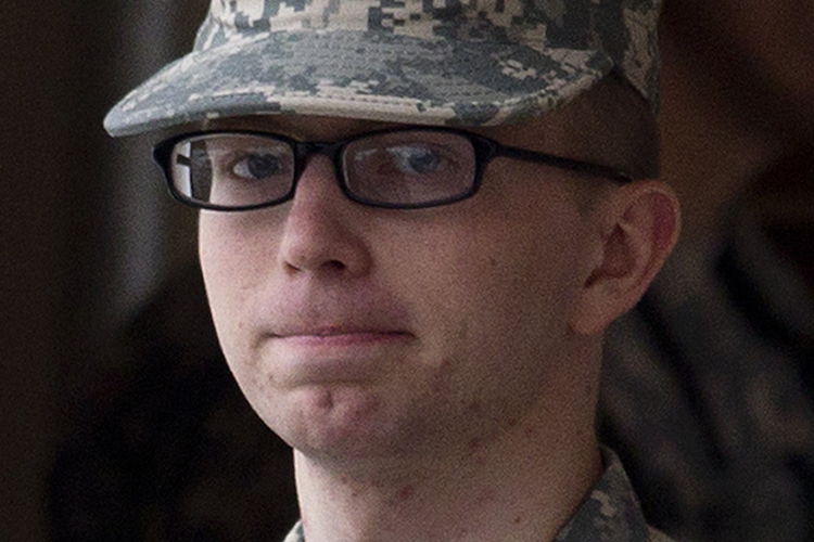 Army Pfc. Bradley Manning is escorted by military police from the courthouse after the sixth day of his Article 32 hearing at Fort Meade, Maryland, December 21, 2011. (Benjamin Myers / Reuters)