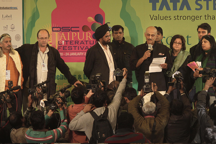 Officials announce the news of calling off Indian born British author Salman Rushdie's video conference at the Jaipur Literature Festival, in Jaipur, in the western Indian state of Rajasthan, Tuesday, Jan. 24, 2012. (AP/Manish Swarup)