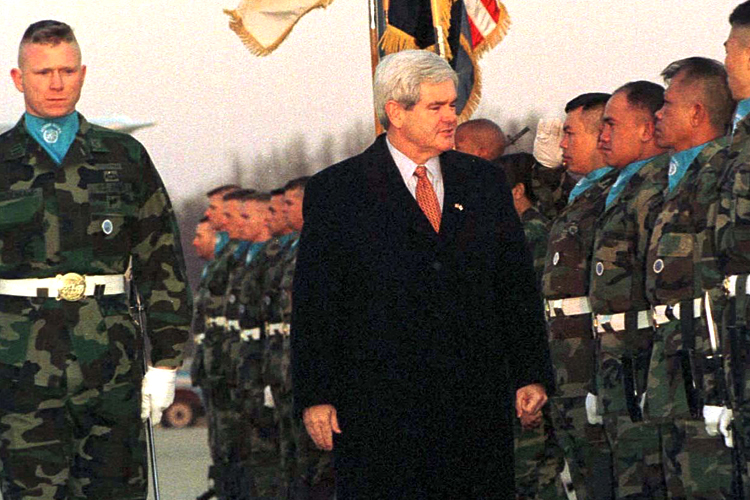 Then U.S. House Speaker Newt Gingrich reviews U.S. military honor guards in South Korea in 1997. (Yun Suk Bong / Reuters)