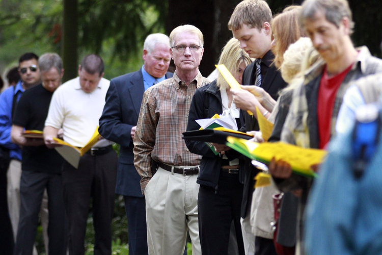 People wait in line at the 2011 Maximum Connections Job and Career Fair Thursday, Sept. 15, 2011, in Portland, Ore. (AP/Rick Bowmer)