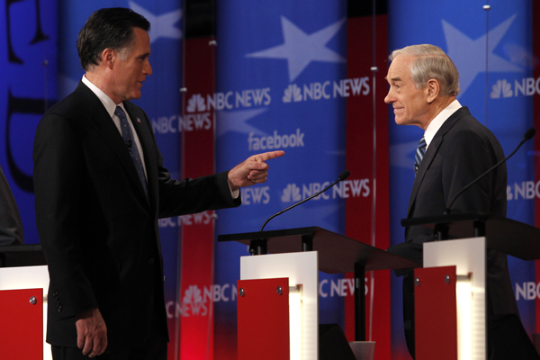 Republican presidential candidates former Massachusetts Governor Mitt Romney and U.S. Rep. Ron Paul (Jessica Rinaldi / Reuters)