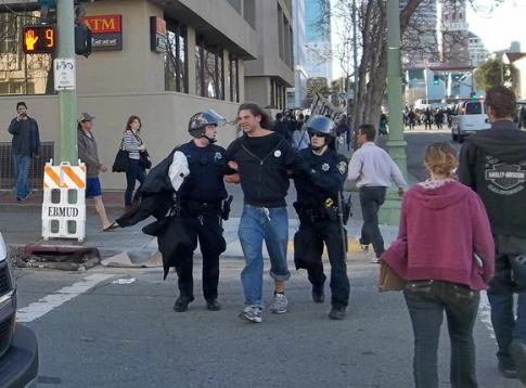 A young Occupy Oakland protester is arrested on Saturday, January 28th, 2011 (Kevin Army)