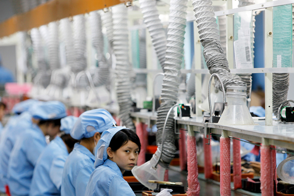 A production line in Suzhou Etron Electronics Co. Ltd's factory in Suzhou, China on June 8, 2010 (Reuters)