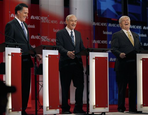 United we tax: Mitt Romney, Ron Paul, Newt Gingrich (AP)