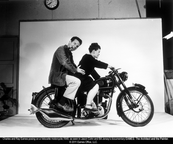 Charles and Ray Eames posing on a Velocette motorcycle in 1948 (Eames Office LLC)
