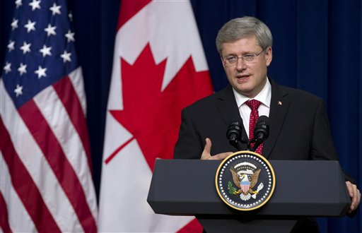 Canadian Prime Minister Stephen Harper speaks at the White House complex in Washington, Wednesday, Dec. 7, 2011 (AP Photo/Carolyn Kaster)
