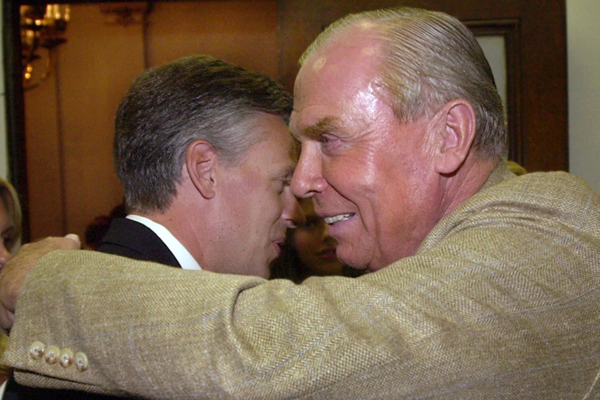 Jon Huntsman Jr., left, and his father, Jon Huntsman Sr. (AP/Douglas C. Pizac)