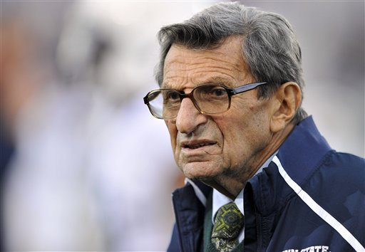 In this Oct. 22, 2011 file photo, Penn State coach Joe Paterno stands on the field before his team's NCAA college football game against Northwestern, in Evanston, Ill. (AP/Jim Prisching)