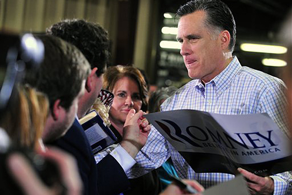 Republican presidential candidate Mitt Romney meets supporters at Cherokee Trike and More in Greer, S.C., Thursday, Jan. 12, 2012. (AP/Michael Justus)
