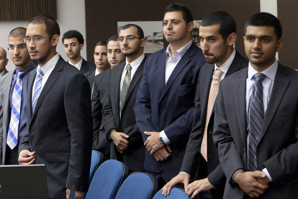 What does the "Irvine 11" have to do with SOPA? (AP/Damian Dovarganes)