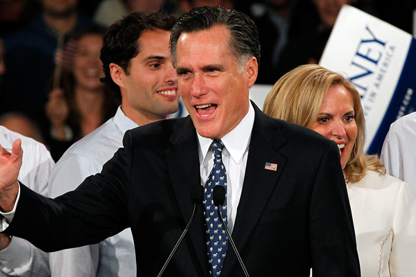 Mitt Romney celebrates at his New Hampshire primary election victory party. (AP/Charles Dharapak)